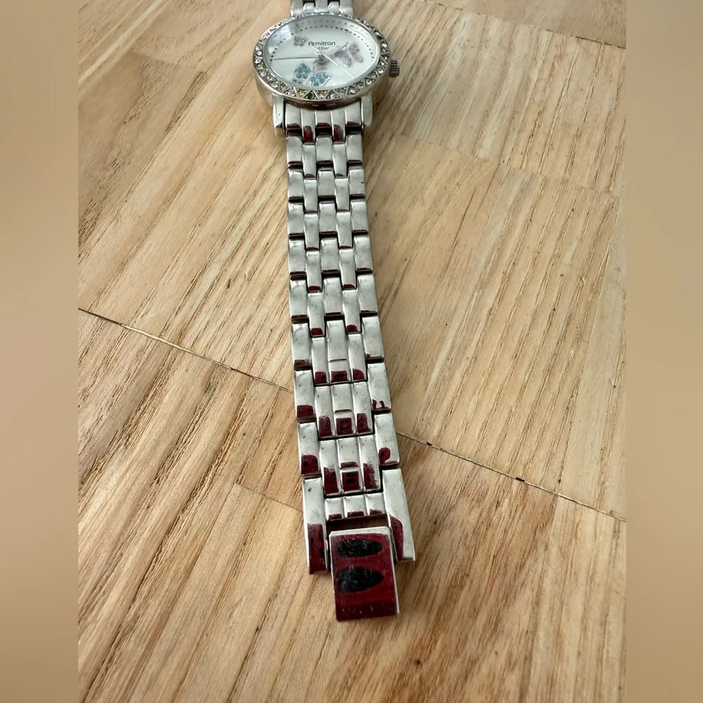Armitron Now ladies butterfly silver tone watch NEW BATTERY